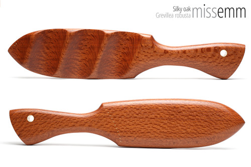 Unique handcrafted spanking toys | Wooden paddle | By kink artisan Miss Emm | Made from silky oak with brass details.