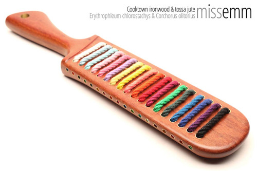 Unique handcrafted spanking toys | Wooden paddle | By kink artisan Miss Emm | Made from Cooktown ironwood with brass details.
