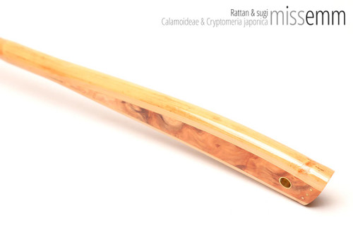 Unique handcrafted bdsm toys | Rattan spanking cane | By kink artisan Miss Emm | The shaft is rattan cane and the handle has been handcrafted from Japanese cedar with brass details.