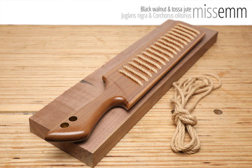 Unique handcrafted bdsm toys | Large rope paddle | By kink artisan Miss Emm | Made from black walnut and tossa jute with brass details.