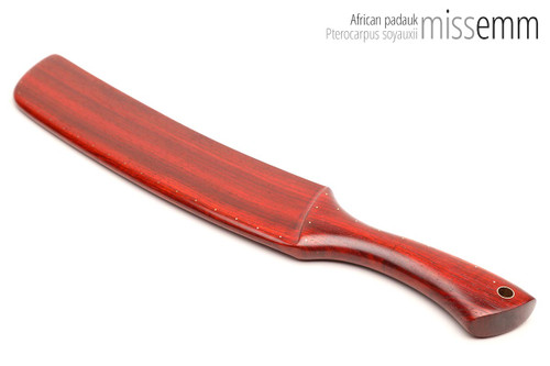 Unique handcrafted bdsm toys | Wooden spanking paddle | By kink artisan Miss Emm | Made from African padauk with brass details.