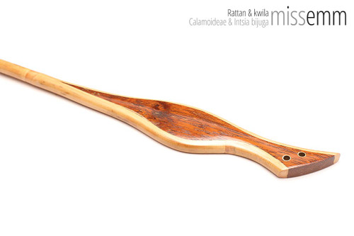 Unique handcrafted bdsm toys | Rattan spanking cane | By kink artisan Miss Emm | The shaft is rattan cane and the handle has been handcrafted from Kwila with brass details.