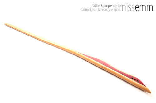 Unique handcrafted bdsm toys | Rattan spanking pane (flat bladed cane) | By kink artisan Miss Emm | The shaft is made from rattan cane and the handle has been handcrafted from purple heart with brass details.