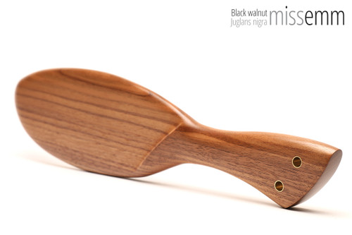 Unique handcrafted bdsm toys | Wooden spanking paddle | By kink artisan Miss Emm | Made from black walnut with brass details.