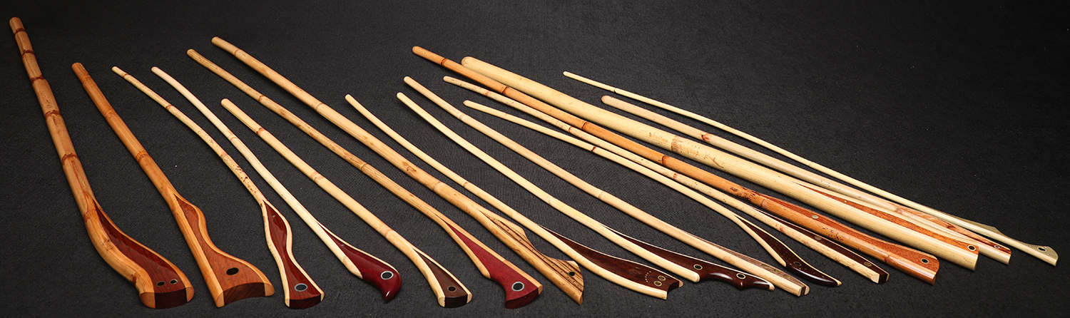 Handcrafted BDSM spanking cane | Rattan loop cane with purpleheart handle