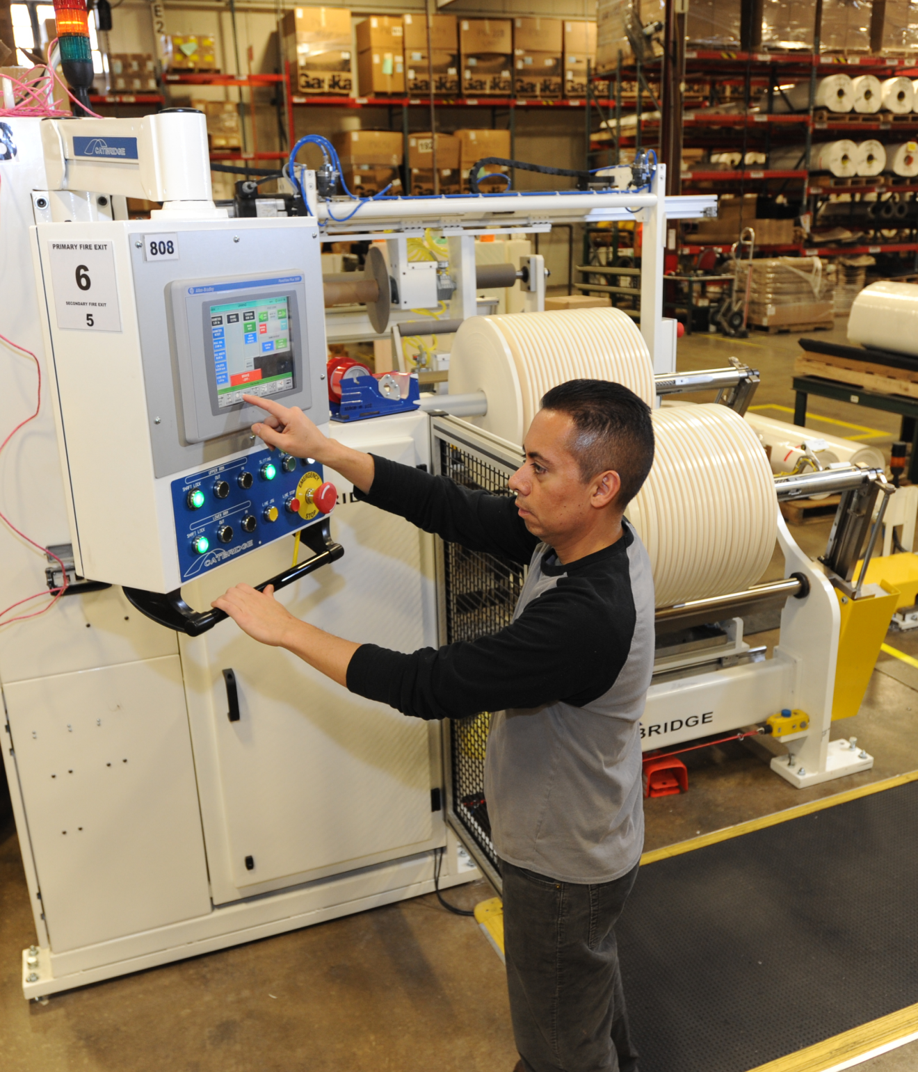 man working with industrial machinery