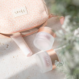Fleur's Floralove Cream, Golden Cream and scent Eye Care spilling out of a Fleur's Beauty Pouch.