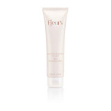 A tube of silky cleansing cream labeled "Fleur's," featuring a minimalist design and French text.