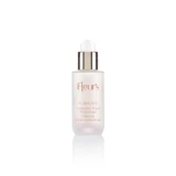 A clear glass bottle with a silver cap, labeled "Fleur's Floralove Prebiotic Floral Concentrate."