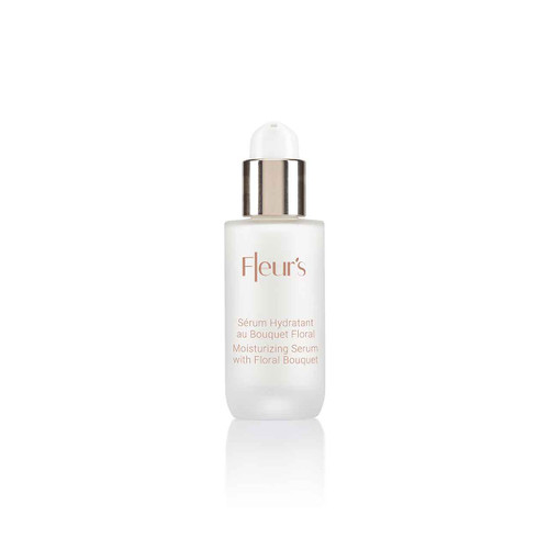 A clear glass bottle of moisturizing serum with a silver cap, labeled "Fleur's" and featuring floral bouquet ingredients. A clear glass bottle of moisturizing serum with a silver cap, labeled "Fleur's" and featuring floral bouquet ingredients.