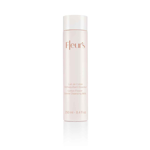 A sleek, pale bottle of Fleur's Cotton Flower Gentle Cleansing Milk, 250 ml, with elegant text on the front.