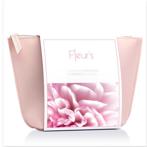 A pink cosmetic pouch with a floral design label, featuring the brand name "Fleur's" and the "FLORASKIN Collection."