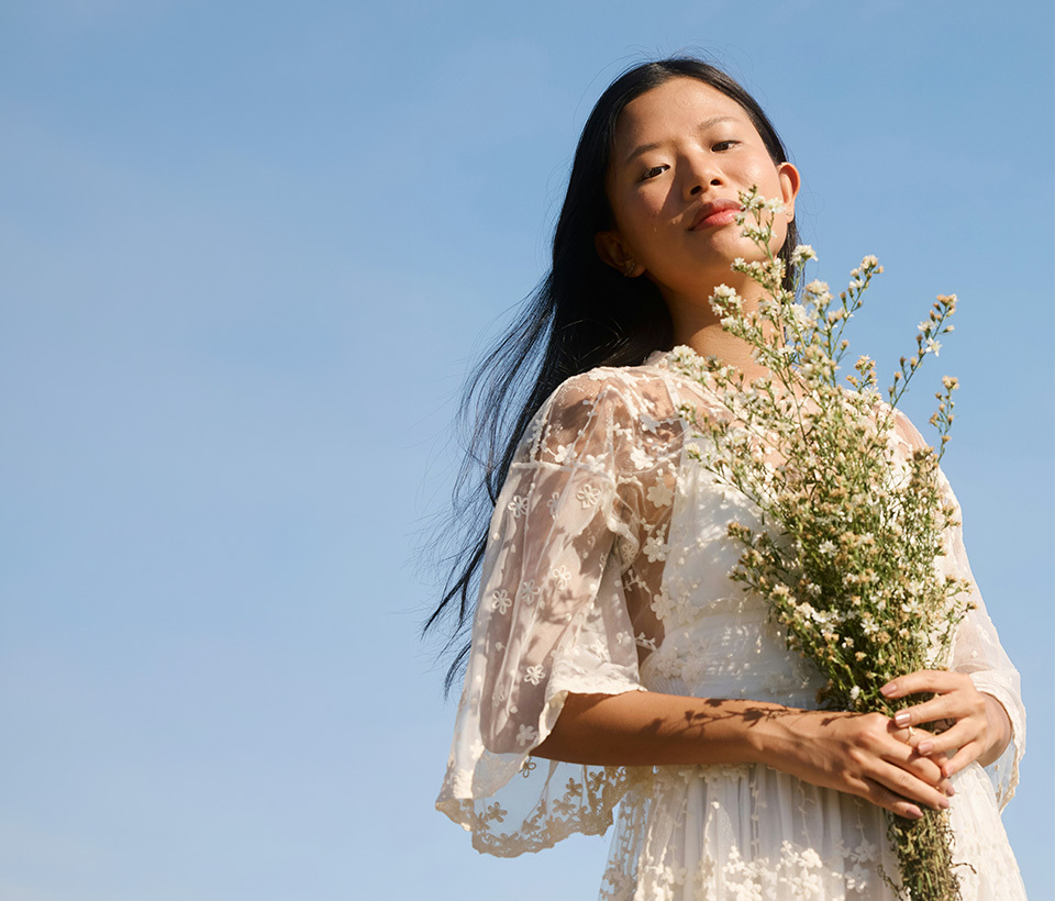 A close-up portrait of a woman.