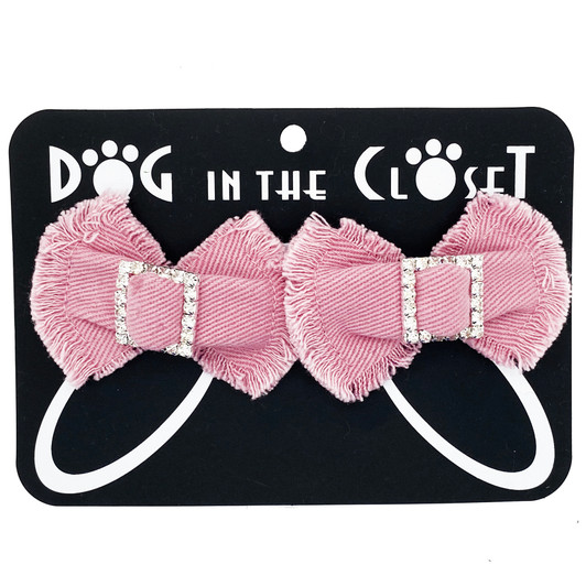 Frayed  pink denim bows with rhinestones coordinate with all of our denim products.  All hair clips are on French barrettes. 