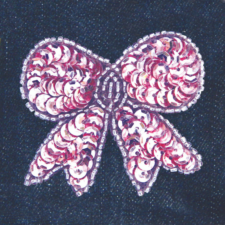 Sequin Bow attaches with Velcro to the Hollywood Vest.