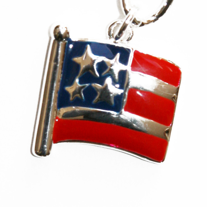 Silver plated chain collar with silver plated charms.
Silver plated flag with hand painted enamel.