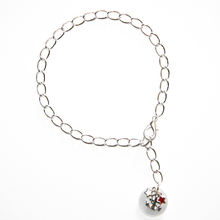 Silver plated chain collar with silver plated charms.
Anchor with enameled star charms on white pearl acrylic disk.