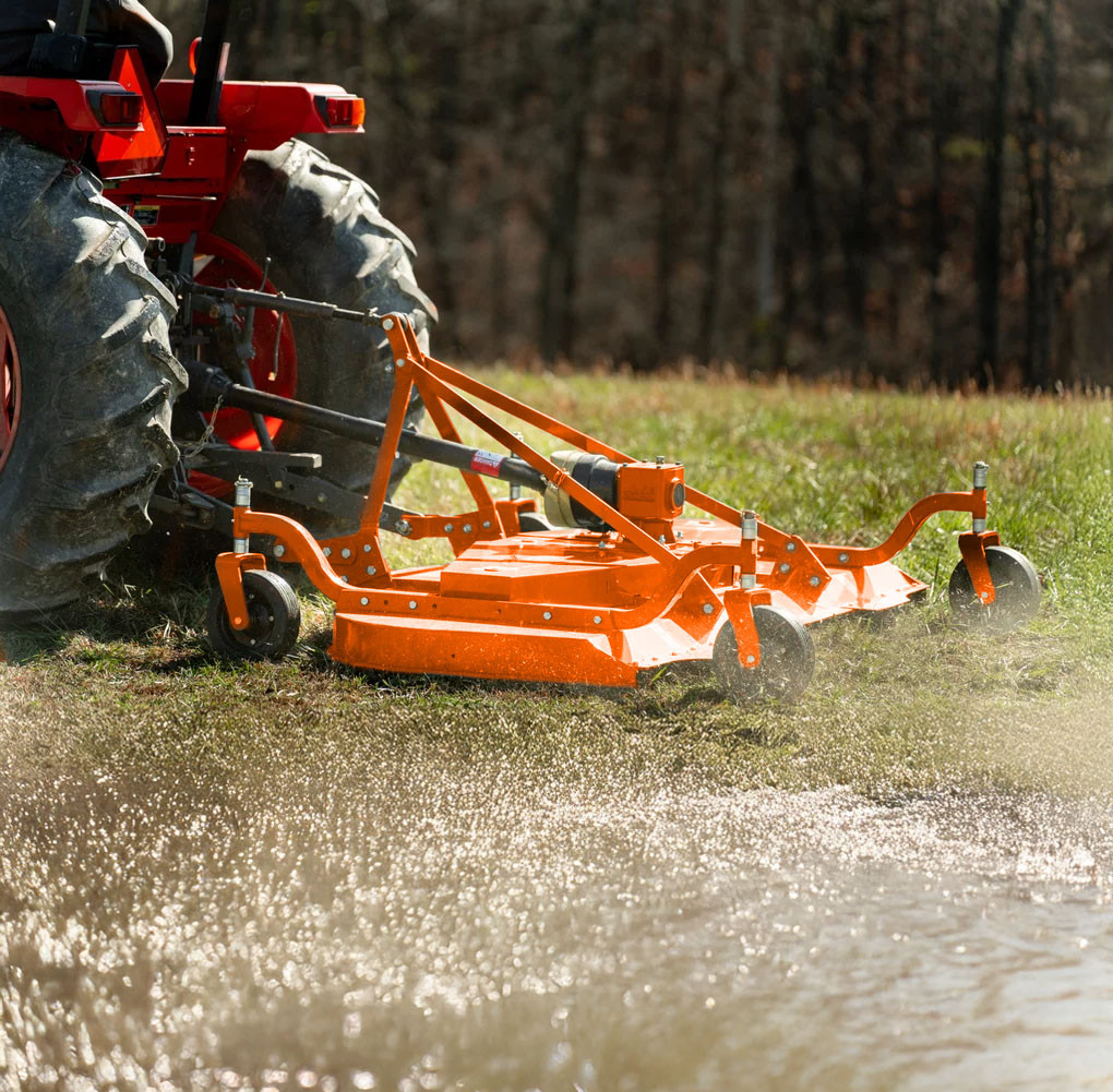 48" Farm-Maxx FMR-48 tractor finish mower in operation cutting pasture grass with compact utility tractor