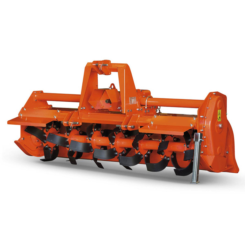 80" Phoenix (Sicma) 3-Point Tractor Rotary Tiller Model T15-80GE-K
Heavy Duty Gear Drive 83"  W/Slip Clutch

Phoenix T15 Series Rotary Tillers are built tough! Utilizing an ingenious load bearing box frame construction and oversize transmission components, these tillers offer flawless performance for as long as you need them on the job! Why settle for less when there is Phoenix!

Standard Features:
Six Tines per Flange, (Curved or Square)
Adjustable Sliding Lower and Upper Links
Heavy Duty Gear Drive in Oil Bath
Welded Single Piece Top Hitch Frame
High Gloss Powder Paint Finish
Optional Equipment:
Spiked Roller
Wheel Kit
Inward Turning End Tine
Rotor With Knives Instead of Tine
Made by Sicma (Italy)
*Images are representative but may vary from actual product
*Some Assembly Required
