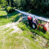 Phoenix Sicma MPE-230 ditch bank flail mower cutting grass along roadside slope