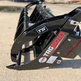 Close-up of reinforced rake grapple tines designed for brush, limbs, logs, and vegetation cleanup
