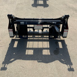 Farm-Maxx TS series skid steer rake grapple for clearing fence rows, storm damage, brush, and unwanted vegetation
