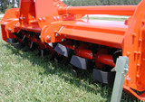 72" Phoenix (Sicma) 3 Point Tractor Super Heavy Duty Rotary Tiller Model T20-72GE
Super Heavy Duty Gear Drive Rotary Tiller W/Slip Clutch

T20 Series Rotary Tillers from Phoenix Line assure you years of trouble free performance even under the most demanding applications. The load bearing frame on which the protective hood and transmission are mounted make this machine extremely sturdy. The unique design dramatically reduces the possibility of clogging, even in sticky or wet soil conditions.

Standard Features:
Heavy Duty Series 6 PTO with Heavy Duty Friction Disc Slip Clutch by Eurocardan
Lateral Gear Drive in Oil Bath.
6 Tines Per Flange
Heavy Duty Adjustable Upper and Lower Hitch Blocks
Four Drag Board Chains on Two Section Drag Board for Ease of Adjustment
Oversized Sealed Bearings
*Images are representative but may vary from actual product
Made by Sicma (Italy)
*Some Assembly Required