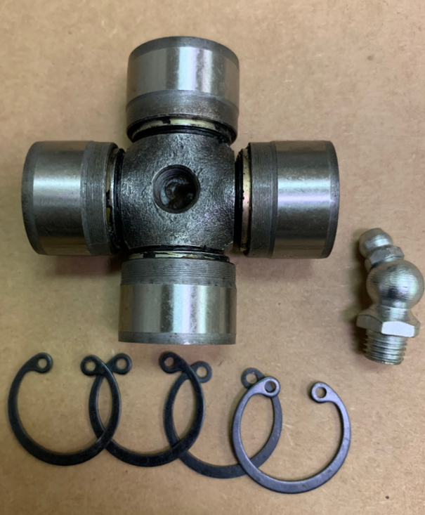 PTO #3-Cross Kit - Designed to condition and support the durability of the PTO drive shafts.

Specifications:

Cap diameter: 27mm
Cross height: 70mm
External snap rings
Rotating bearings

Fits:

Eurocardan Series 3 PTO Shafts with grease zerk in center of the cross

Made by Eurocardan/Italy