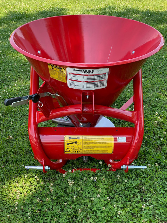 $714 - Farm-Maxx (Cosmo) 3 Point Tractor Spin Spreader Model SP-300 | Raleigh, NC | Styron Ag Parts & Implements | Farm Implements
Farm-Maxx 3 Point Tractor Spin Spreader Model SP-300
765Lb Capacity W/PTO Stainless Disc, 6 Vanes, Agitator Standard

Precision material application is assured with your Unifarm SP and SPL Series Spin Spreaders.
Produced by the recognized world leader in spreader quality and design, these units have been time tested and proven all over the world. Useful for application of many types of materials these spreaders are used by farmers, landscapers, golf courses, grounds keepers, homeowners and field sportsmen alike.

Model	Capacity	Hitch/Hopper
SP-180	481 lbs	3 pt./ Metal
SP-300	785 lbs	3 pt./ Metal
SP-500	1027 lbs	3 pt./ Metal
SPL-180	480 lbs	3 pt./ Poly
SPL-400	844 lbs	3 pt./ Poly

Standard Features:

Metal Hopper
High Tempurature Epoxy Finish
Eurocardan Series 1 PTO Shaft - included
Optional Stainless Steel Disc W/Adjustable Vanes
Heavy Duty Tubular Steel Chasis
Standard Rigid Agitator
*Assembly Required