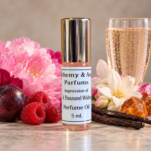 A Thousand Wishes impression perfume oil in a 5 mL rollerball.