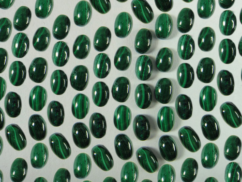 Malachite 4x6mm oval cabochons - pack of 10.