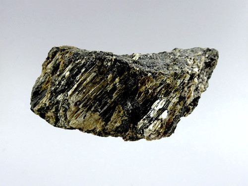 Specimen has mica embedded in the tourmaline