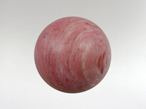 Gorgeous pink rhodonite sphere.