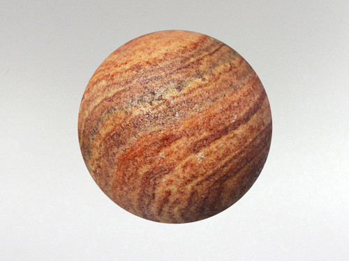 Stunning rainbow sandstone sphere with beautiful natural patterns.