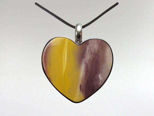 Mookite Jasper heart pendant set in surgical quality stainless steel on black cord.