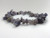 Iolite sunstone (Water sapphire) chip bracelet strung on stretch elastic.