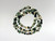 Orbicular Jasper chip bead necklace strung on nylon thread.