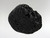 Tektites are natural glass rocks that are formed from terrestrial debris ejected during extraterrestrial impacts.