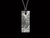 Quartz Clear flat rectangle pendant on black waxed cord.