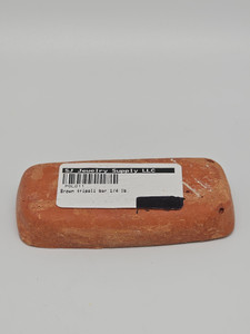 Brown Tripoli Bar (1/4 Lb).
Brown Tripoli compound is a type of polishing agent that has a medium abrasive and is primarily used to remove scratches and firescale from metal surfaces. It is ideal for providing a pre-polish finish on most metals, giving them a smooth and polished appearance. To apply the Tripoli compound, simply spin a buffing wheel on a motor or drill and gently press the compound onto the wheel. As the wheel spins, the heat and friction generated will transfer a small amount of the compound onto the wheel for polishing.
It is important to note that there is a significant difference between the Tripoli and rouge compounds. While rouges are mainly used for polishing and finishing work, Tripoli compounds are used for cutting and buffing to remove scratches from the metal. If you compare the two compounds, you will notice that rouges provide a high-gloss shine, whereas Tripoli compounds are primarily used to remove imperfections and scratches, resulting in a smooth and even surface. Brown Tripoli Bar (1/4 Lb).
Brown Tripoli compound is a type of polishing agent that has a medium abrasive and is primarily used to remove scratches and firescale from metal surfaces. It is ideal for providing a pre-polish finish on most metals, giving them a smooth and polished appearance. To apply the Tripoli compound, simply spin a buffing wheel on a motor or drill and gently press the compound onto the wheel. As the wheel spins, the heat and friction generated will transfer a small amount of the compound onto the wheel for polishing.
It is important to note that there is a significant difference between the Tripoli and rouge compounds. While rouges are mainly used for polishing and finishing work, Tripoli compounds are used for cutting and buffing to remove scratches from the metal. If you compare the two compounds, you will notice that rouges provide a high-gloss shine, whereas Tripoli compounds are primarily used to remove imperfections and scratches, resulting in a smooth and even surface.