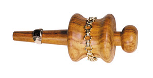 Wooden Polishing Holder. For holding metal, mainly chains, while polishing.
The Wooden Polishing Holder is a tool used in jewelry making to hold metal pieces, particularly chains, while polishing. The holder has a wooden handle and a metal clip that holds the chain securely in place. The wooden handle provides a comfortable grip and prevents the metal from getting too hot during the polishing process.
The best uses for the Wooden Polishing Holder are to securely hold the chain in place while polishing and to prevent the chain from getting tangled or knotted during the polishing process. It also allows the jeweler to polish hard-to-reach areas of the chain without getting their fingers in the way.
A unique use for the Wooden Polishing Holder is to use it as a third hand when soldering or welding small metal pieces together. The holder can be used to hold one piece in place while the jeweler solders or welds the other pieces together.
One must-have jewelry making item to use alongside the Wooden Polishing Holder is a polishing cloth or buffing wheel. These tools can help achieve a high shine on the metal after polishing. Wooden Polishing Holder. For holding metal, mainly chains, while polishing.
The Wooden Polishing Holder is a tool used in jewelry making to hold metal pieces, particularly chains, while polishing. The holder has a wooden handle and a metal clip that holds the chain securely in place. The wooden handle provides a comfortable grip and prevents the metal from getting too hot during the polishing process.
The best uses for the Wooden Polishing Holder are to securely hold the chain in place while polishing and to prevent the chain from getting tangled or knotted during the polishing process. It also allows the jeweler to polish hard-to-reach areas of the chain without getting their fingers in the way.
A unique use for the Wooden Polishing Holder is to use it as a third hand when soldering or welding small metal pieces together. The holder can be used to hold one piece in place while the jeweler solders or welds the other pieces together.
One must-have jewelry making item to use alongside the Wooden Polishing Holder is a polishing cloth or buffing wheel. These tools can help achieve a high shine on the metal after polishing.