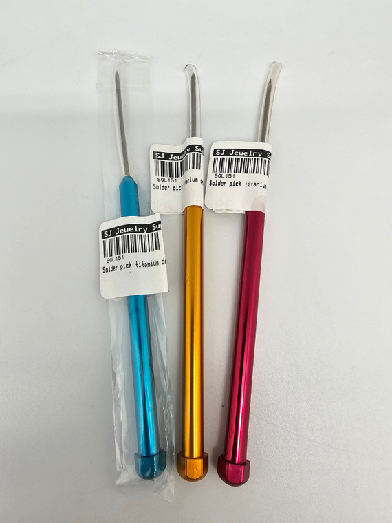 Solder Pick Titanium Deluxe (1pc). Available in red, blue or gold color (if you'd like to pick your color, please write it in the "notes/messages" section at check-out. A solder pick is a small, pointed instrument designed to help you move solder into place. Be careful not to get the metal too near the flame, or it will melt. Also, take care not to fuse the solder to the solder pick. However, titanium and tungsten solder picks have a tendency to resist solder.