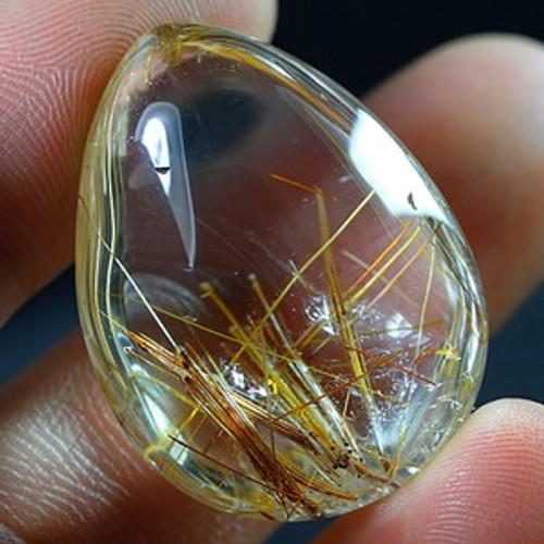 60.5 carat Natural Rutilated Quartz Cabochon