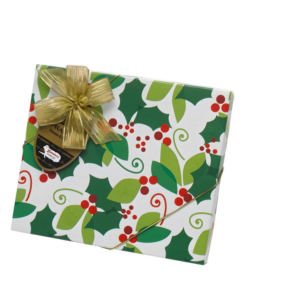 Festive gift box of Lammes Candies Texas Chewie Pecan Pralines wrapped with a gold ribbon, perfect for holiday gifting.