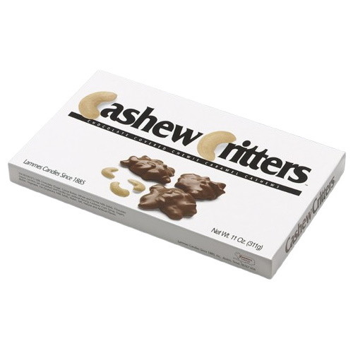 Lammes Candies Cashew Critters Chocolate Caramel Candies box features a sleek white design with bold lettering, showcasing images of chocolate-coated cashew and caramel clusters alongside whole cashews.