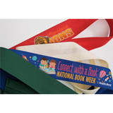 A collection of fabric bands in red, blue, green, and white, featuring various designs and a logo.