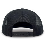 A black trucker cap featuring a mesh back and an adjustable strap. The interior is not visible.