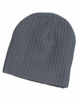 A cable knit beanie in a dark grey colour, featuring a ribbed texture and a logo on the side.