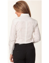 A white long sleeve button-up shirt with a tuck front design and a tailored fit, featuring a logo.