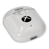 A white charging case for wireless earbuds, featuring an Xbox logo and a clear plastic cover.